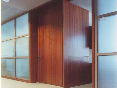 Glass partition system with full height doors
